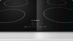 Classixx 4 zone ceramic induction hob PIE611B17E black glass