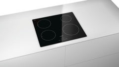 Classixx 4 zone ceramic induction hob PIE611B17E black glass