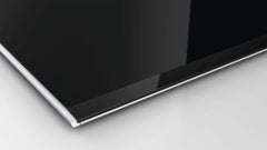 Logixx 4 zone ceramic induction hob PIE975N14E black glass with stainless steel trim